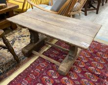 An antique oak coffee table, (altered) width 98cm, depth 52cm, height 51cm