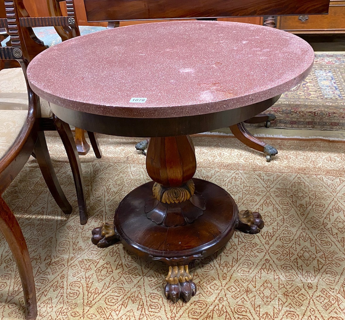 A Victorian parcel gilt rosewood pedestal now as an occasional table with circular faux porphyry