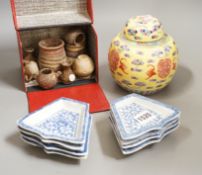 A set of Chinese blue and white supper dishes, late Qing and a Chinese yellow ground jar cover,