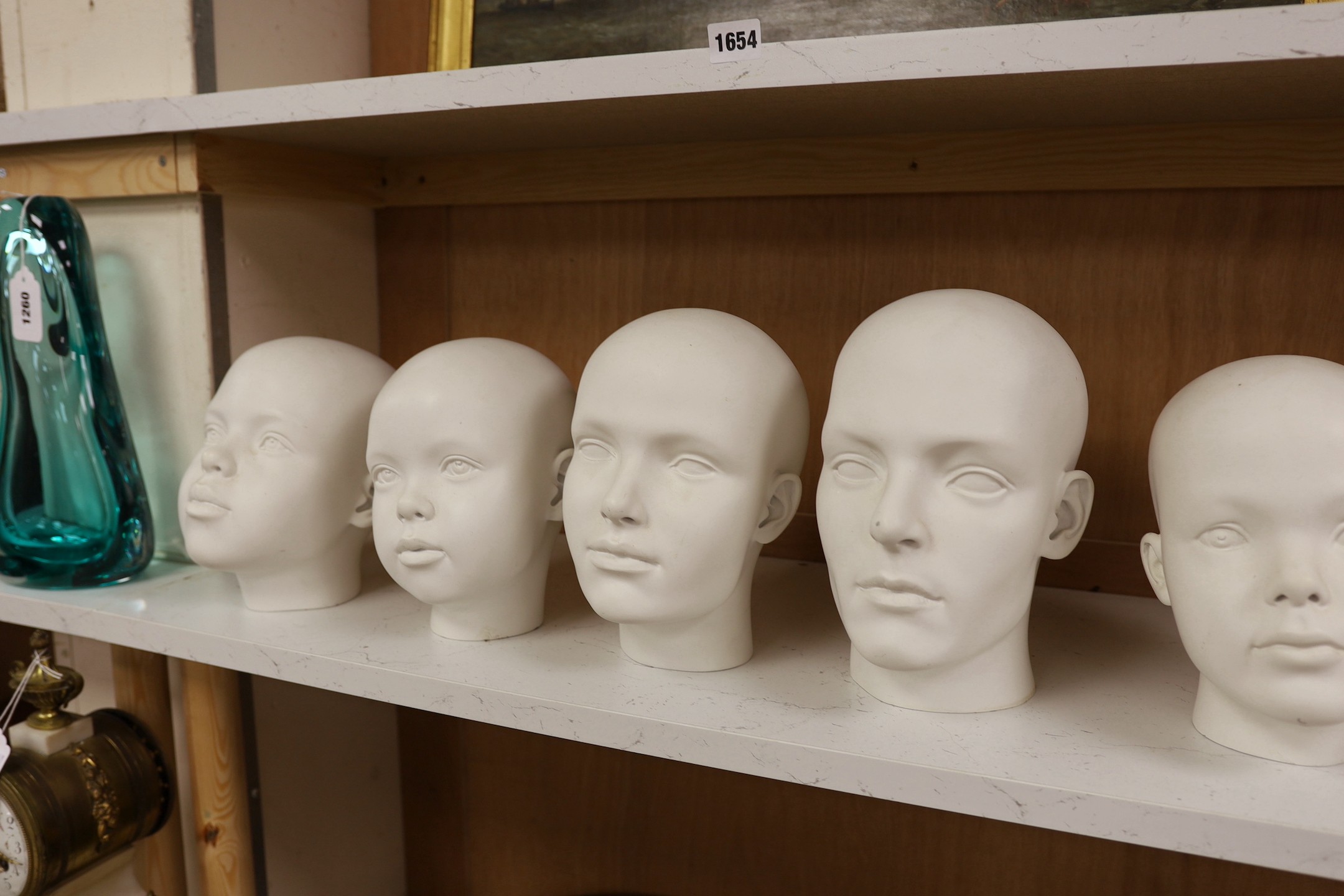 A set of seven fibreglass mannequin heads, largest 23cms high - Image 2 of 3