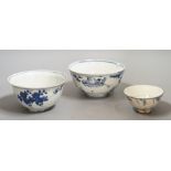 Three Chinese late Ming blue and white bowls, one painted with figures in a boat on horseback and in