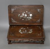A pair of Chinese hongmu and mother of pearl inlaid stands, 19th century, 31cm wide