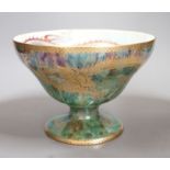 A Wedgwood dragon lustre pedestal bowl, designed by Daisy Makeig-Jones, pattern z4831, 14cms high