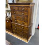 A George III mahogany chest on chest with dentil cornice, two short and six graduated long draws