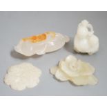Two Chinese jade flower head carvings, Ming dynasty, a white Jade group of two boys and a monkey and