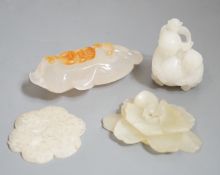 Two Chinese jade flower head carvings, Ming dynasty, a white Jade group of two boys and a monkey and