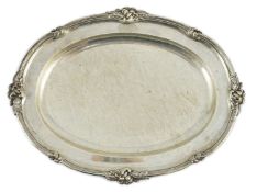 A William IV oval silver meat dish by William Kerr Reid, with reeded foliate border and engraved