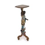 A 19th century Venetian carved wood and polychrome gondolier blackamoor table, the stem carved as