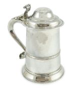 A George III silver tankard, maker I.D, with scroll thumbpiece and banded girdle, the handle with