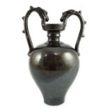 A Chinese dark brown glazed twin handled amphora, in Tang style probably Republic period, of