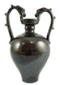 A Chinese dark brown glazed twin handled amphora, in Tang style probably Republic period, of