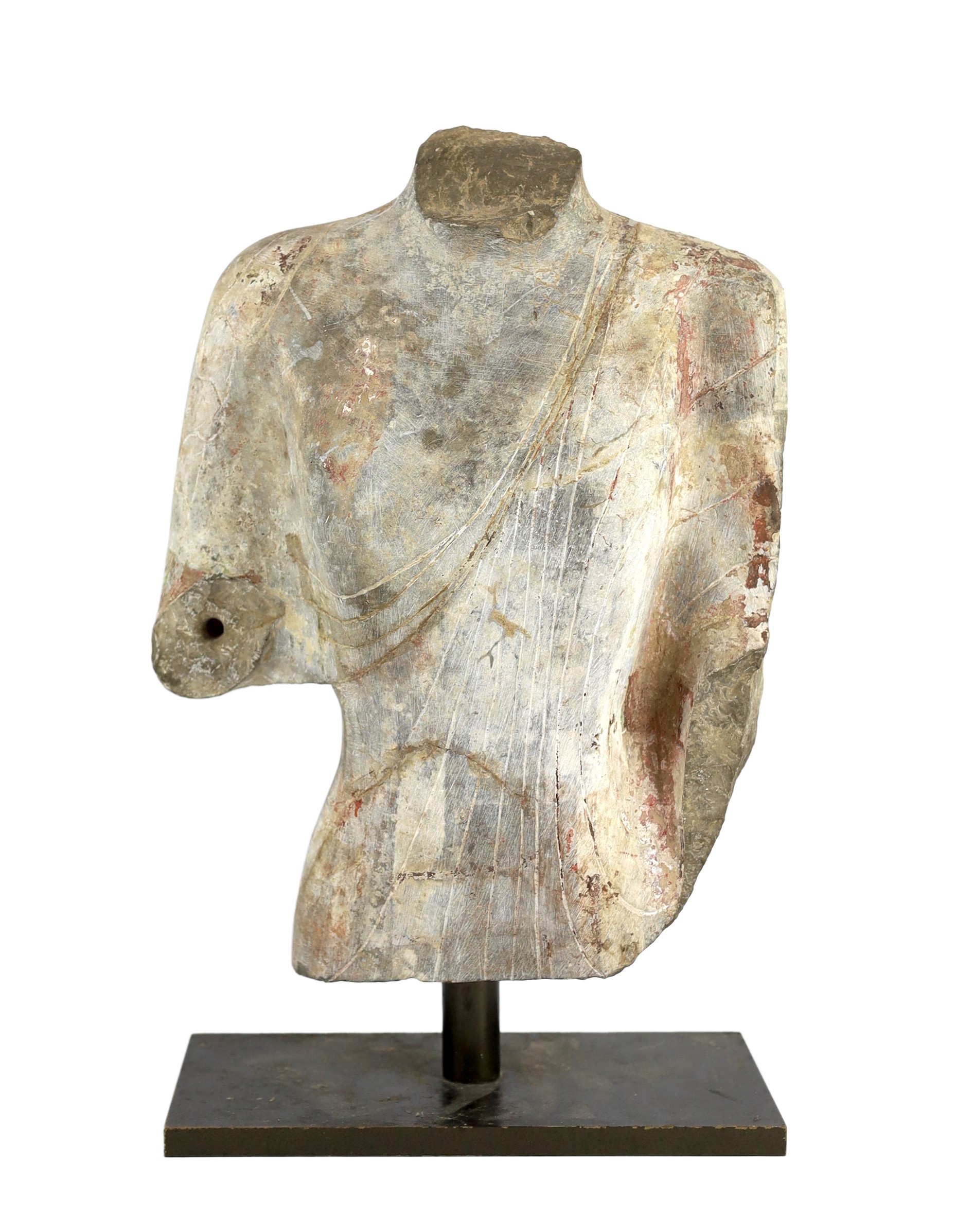 A Chinese pigment painted limestone torso of Buddha, probably Northern Qi dynasty (550-577 CE),