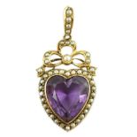 A late Victorian gold, heart shaped amethyst and seed pearl set drop pendant, overall 46mm, gross