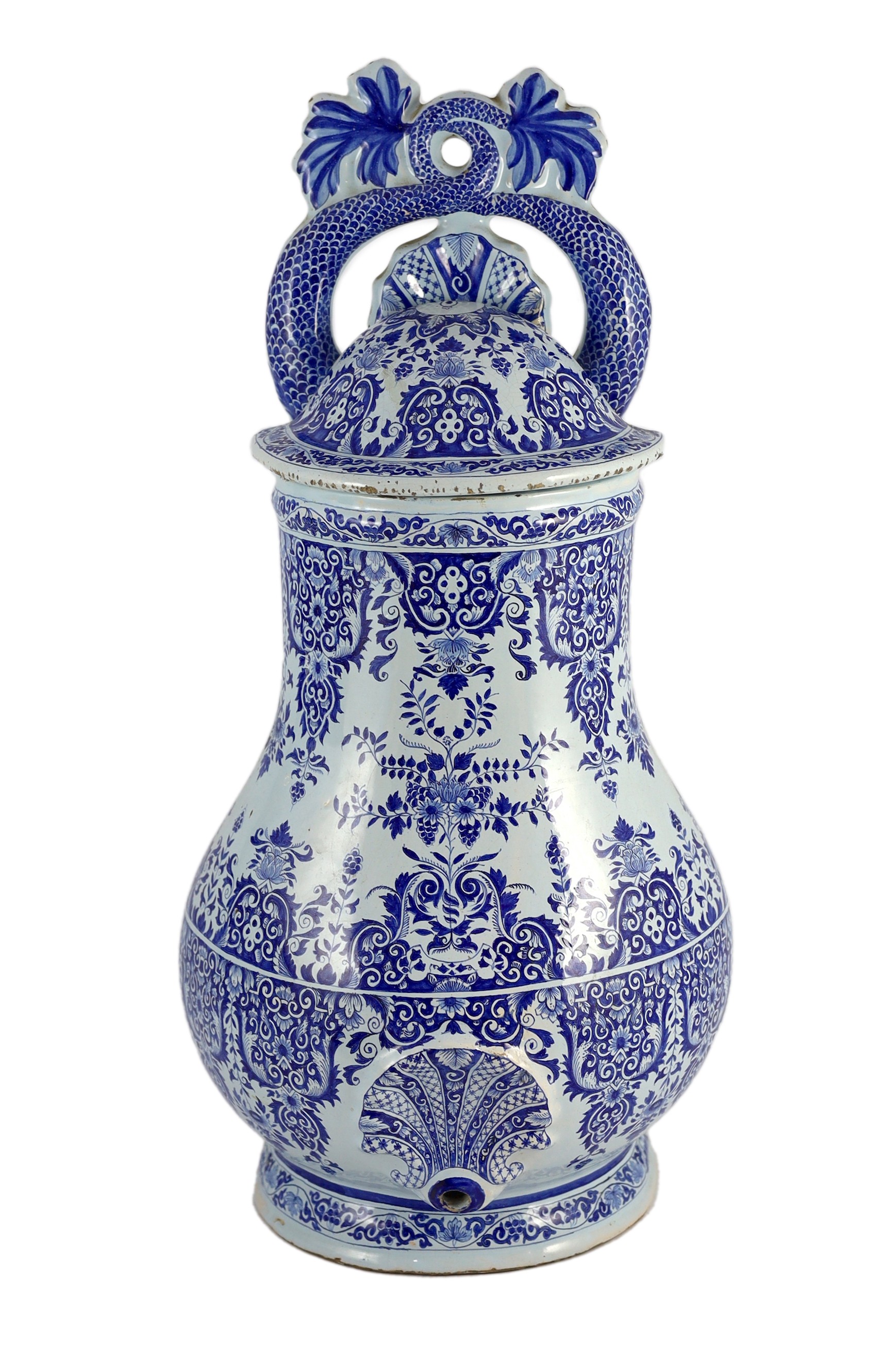 A large Rouen faience blue and white cistern, second quarter 18th century, painted with foliate