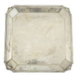 A George V square silver salver, by Atkin Brothers, with reeded border and canted corners with shell