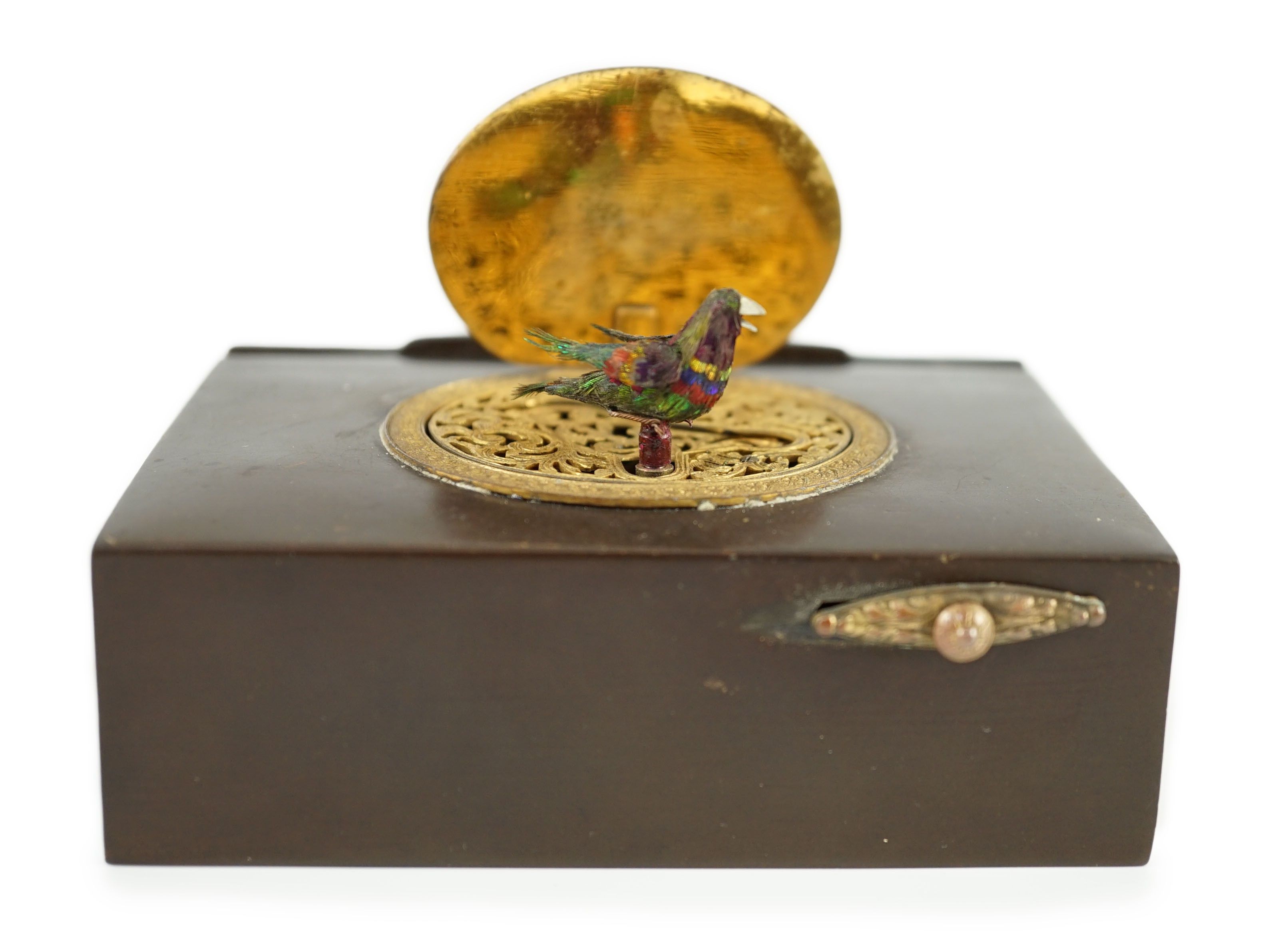 A late 19th century Swiss gilt metal mounted phenolic singing bird box, the lid decorated in - Image 4 of 6