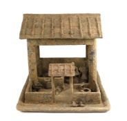 A large Chinese grey pottery model of a farmstead, Han dynasty (200BCE - 220CE), the open roofed