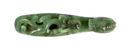 A Chinese bright spinach green jade ‘dragon’ belt hook, 18th/19th century, carved in high relief and