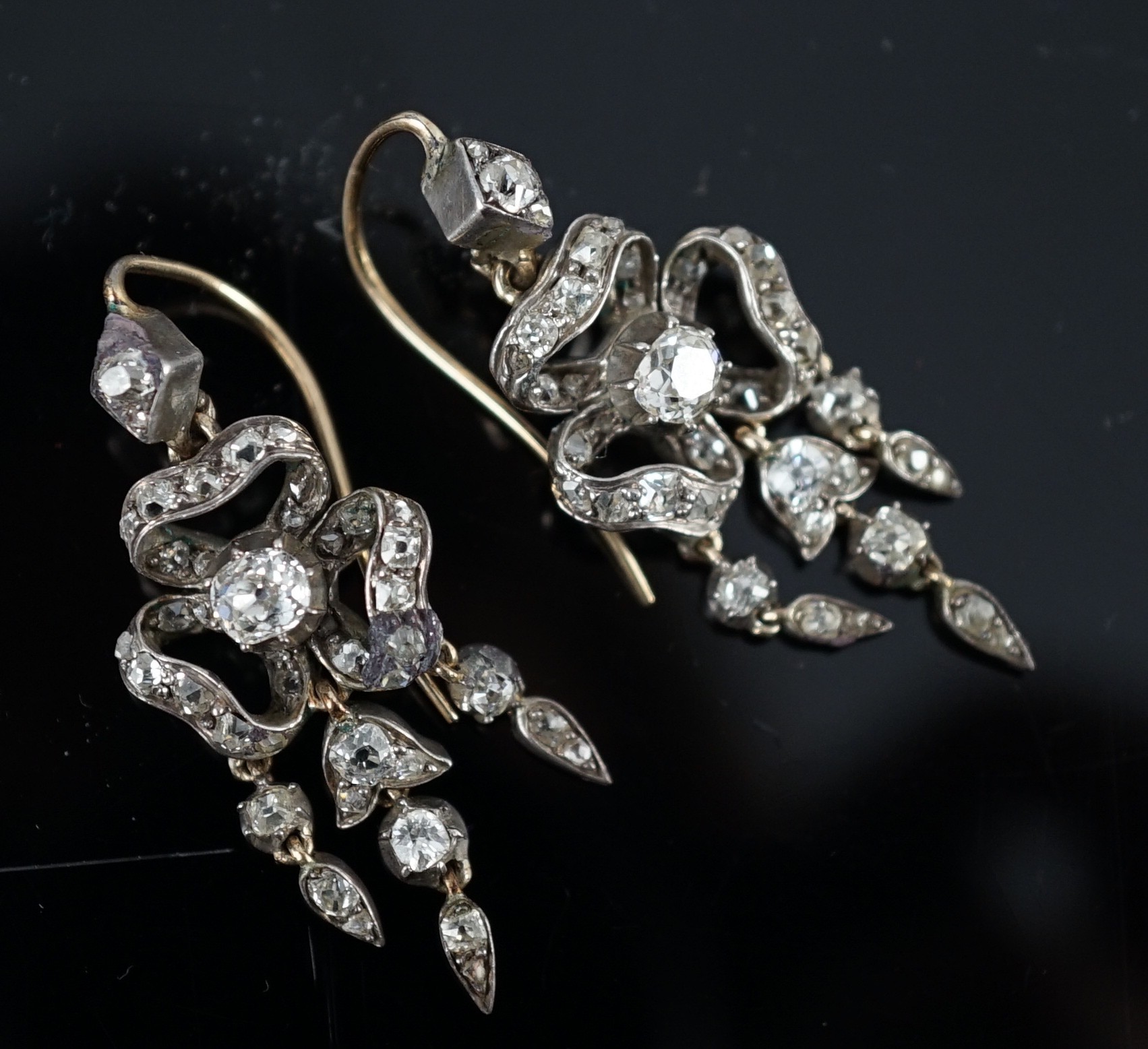 A pair of 19th century gold, silver and old cut diamond set drop earrings, of ribbon bow form, 37mm, - Image 3 of 6