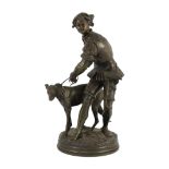 Adrien Etienne Gaudez (French, 1845-1902). A bronze group of a huntsman and hound, signed in the