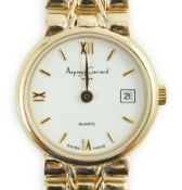 A lady's 2002 9ct gold Asprey & Garrard quartz wrist watch, on a 9ct gold bracelet, with Roman and
