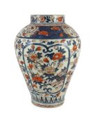 A large Japanese Arita ovoid vase, 18th century, painted in Imari palette with peonies,