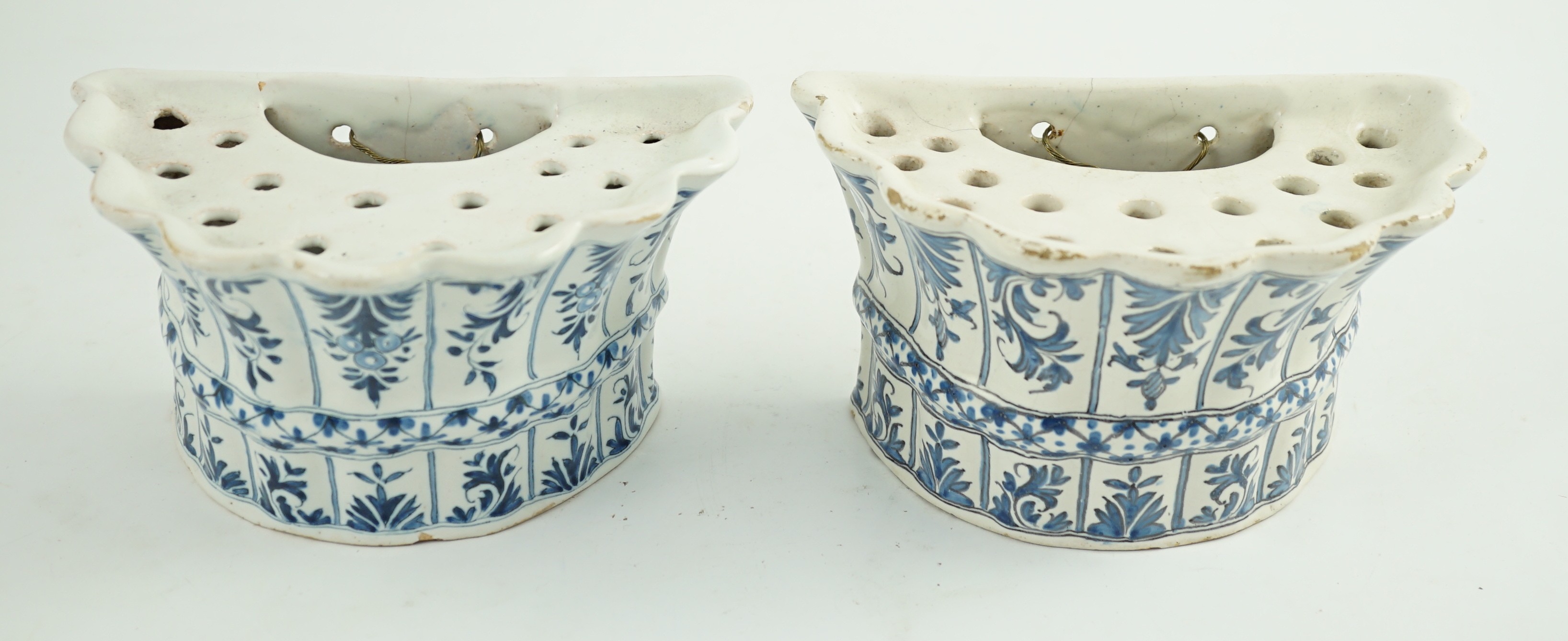 Two similar 18th century Delft blue and white hanging bough pots, of lobed demi-lune shape, - Image 3 of 7