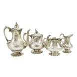 A Victorian silver pedestal four piece tea and coffee service by Robert Harper, of panelled baluster