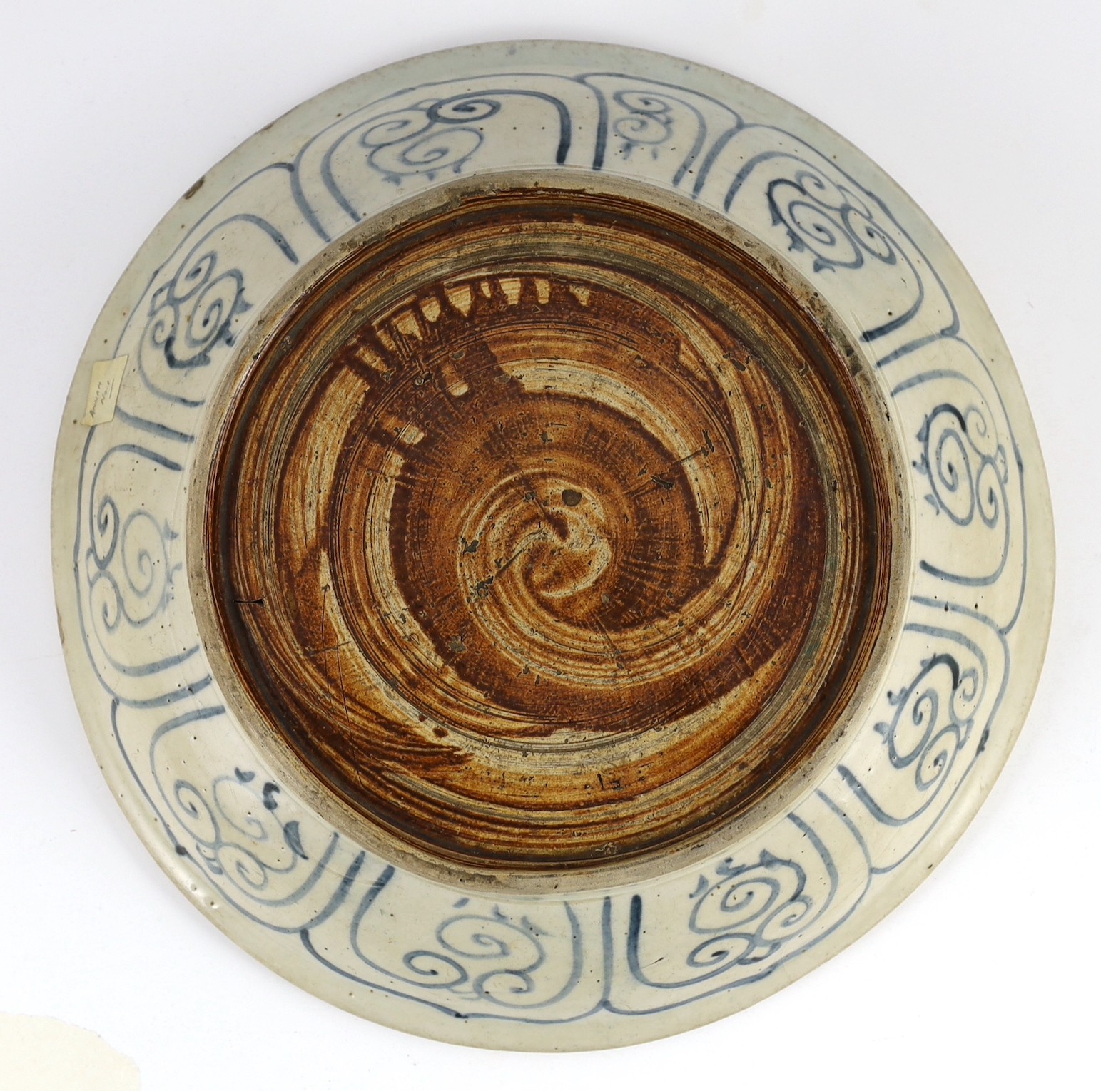 A large Annamese blue and white dish, 16th century, the centre painted with a flower and broad - Image 2 of 2