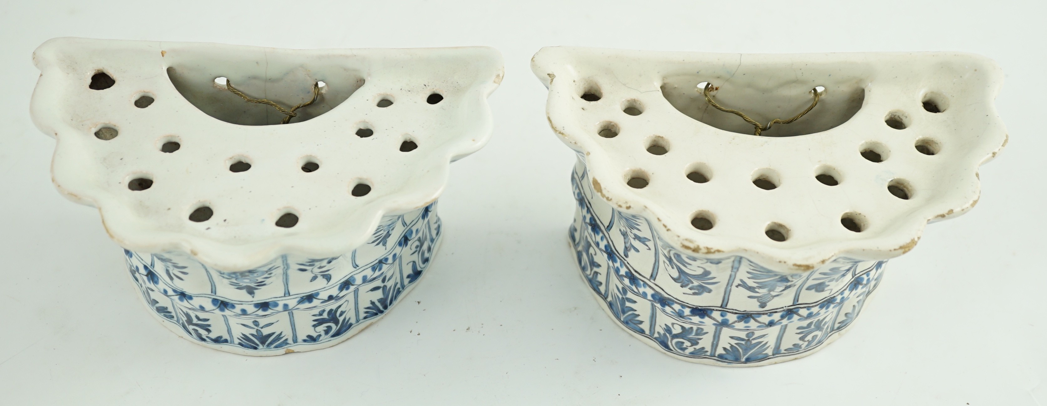 Two similar 18th century Delft blue and white hanging bough pots, of lobed demi-lune shape, - Image 4 of 7