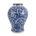 A Chinese blue and white ‘phoenix’ vase, Kangxi period, painted with phoenixes amid flowers and