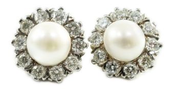 A pair of white gold? cultured pearl and diamond cluster set circular earrings, the pearls