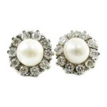 A pair of white gold? cultured pearl and diamond cluster set circular earrings, the pearls