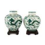 Two similar Chinese green enamelled ‘dragon’ jars and covers, Daoguang mark and period (1821-50),