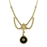 A Victorian gold, black enamel and seed pearl set mourning pendant necklace, the pendant verso