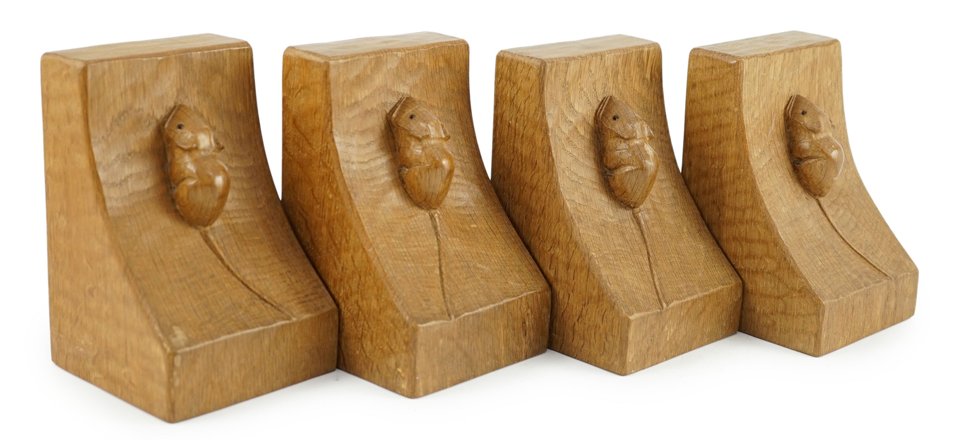 Two pairs of Robert Thompson Mouseman Thompson oak bookends, each carved with a mouse, width 9.5cm