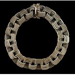 A modern Italian Uno A Erre textured 18ct gold interwoven bracelet, 17cm, 55.3 grams.***CONDITION