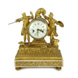 Viger à Paris. An early 19th century French ormolu mantel clock, surmounted with figures of a King