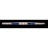 A 1920's/1930's 15ct gold and platinum, diamond and synthetic? sapphire set bar brooch, of