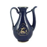 A Chinese late Ming blue glazed and slip decorated ‘qilin’ ewer, for the Islamic market, the