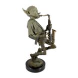 § § David Goode (British, b.1966). A bronze of a pixie saxophone player, signed and dated 1998,