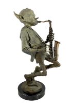 § § David Goode (British, b.1966). A bronze of a pixie saxophone player, signed and dated 1998,