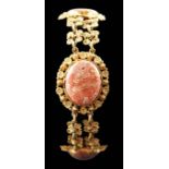 An early 19th century gold and four stone oval cabochon hardstone set bracelet, with flower head