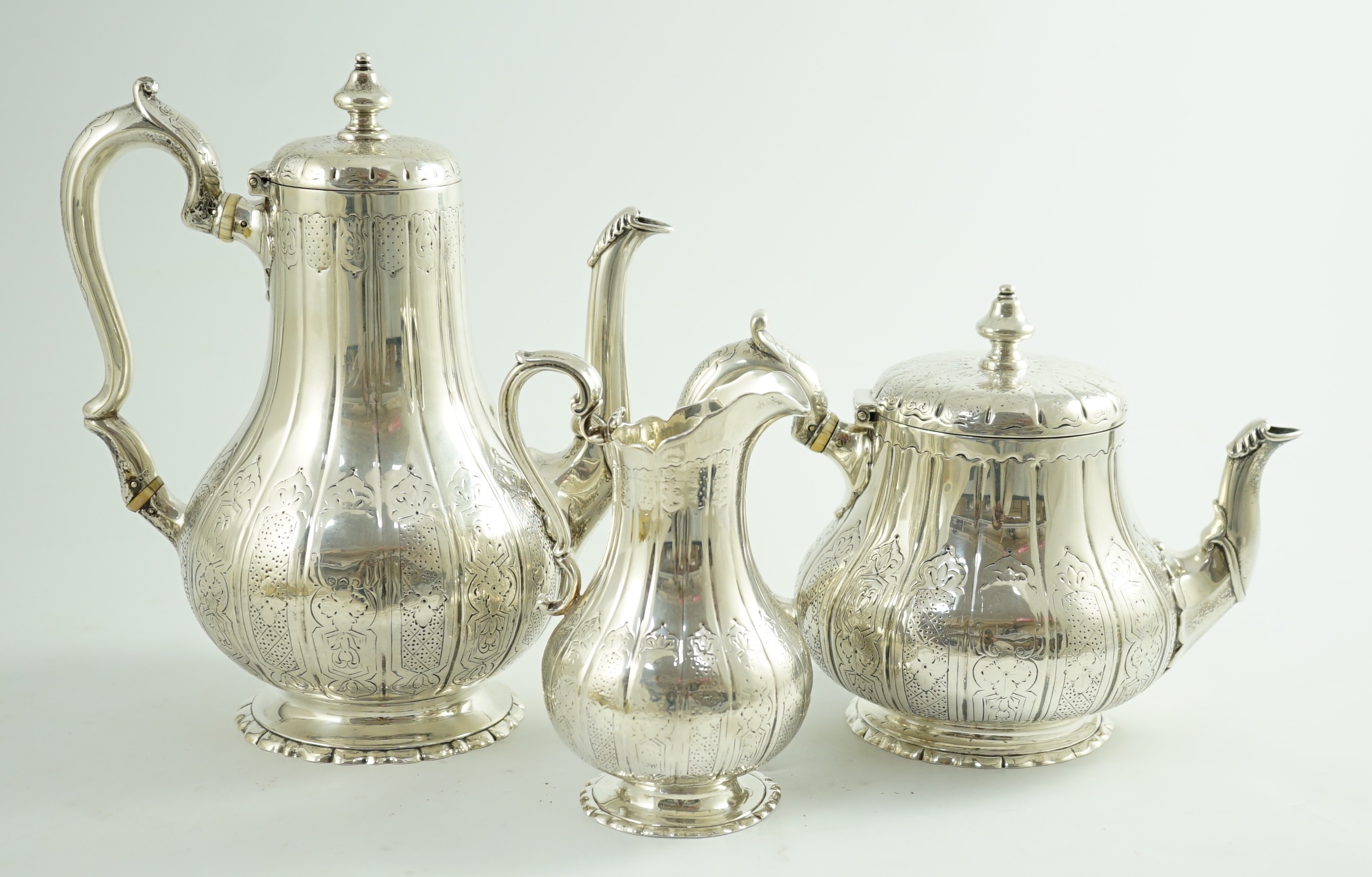 A Victorian silver three piece coffee set, comprising pot, cream and sugar bowl, by Walter Morrisse, - Image 2 of 6