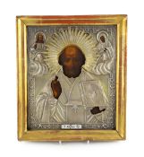 A 19th century Russian icon of St. Nicholas with 84 zlotnik oklad dated 1862, 30 x 26cm***