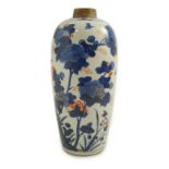 A Chinese Imari tall ovoid jar, Kangxi period, painted with a scholar and attendant in a mountainous