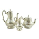 A Victorian silver three piece coffee set, comprising pot, cream and sugar bowl, by Walter Morrisse,