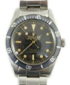 A gentleman's rare 1956 stainless steel Rolex Oyster Perpetual 100/330 Submariner wrist watch,