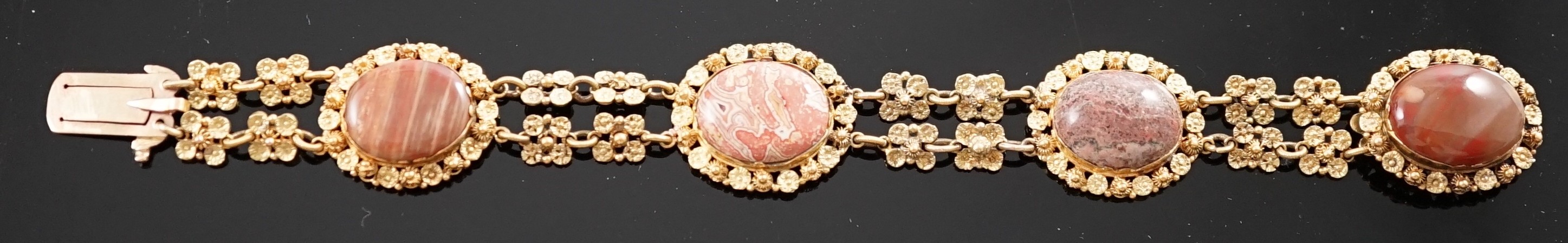 An early 19th century gold and four stone oval cabochon hardstone set bracelet, with flower head - Image 4 of 5