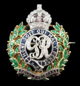 A gold and platinum, ruby, sapphire, emerald and diamond chip set Royal Engineers brooch, height